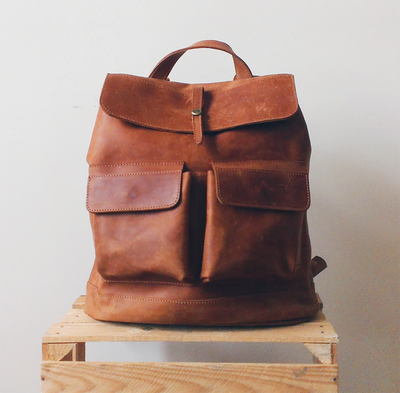 handcrafted leather backpack in cognac brown color with lining