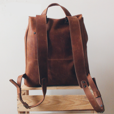 handcrafted leather backpack in cognac brown color with lining